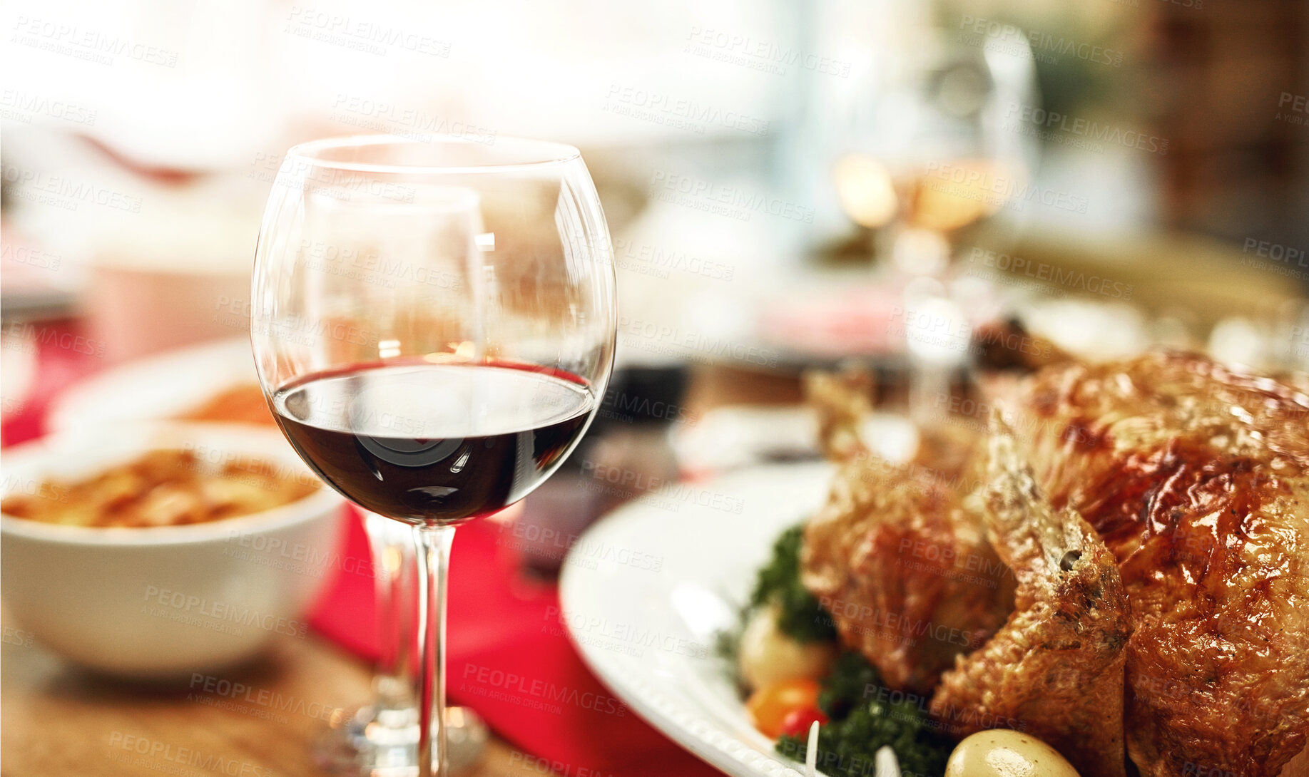 Buy stock photo Christmas, food and alcohol on table in home for dinner party, celebration and family or social event. Closeup of feast, lunch and gourmet meal for holiday, festive eating and Thanksgiving with wine