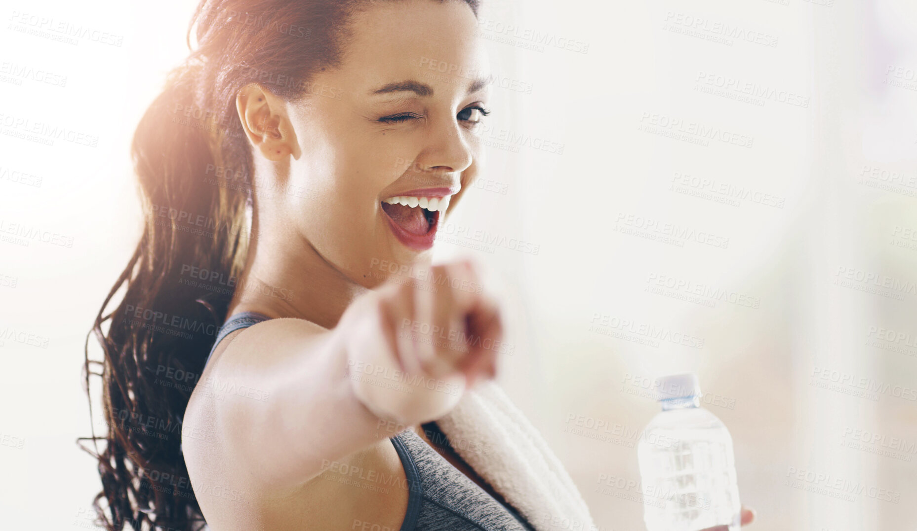 Buy stock photo Fitness, water and portrait of woman with point for exercise, sports motivation and h2o hydration. Wink, athlete and female person with hand gesture in gym for workout, opportunity or vote feedback