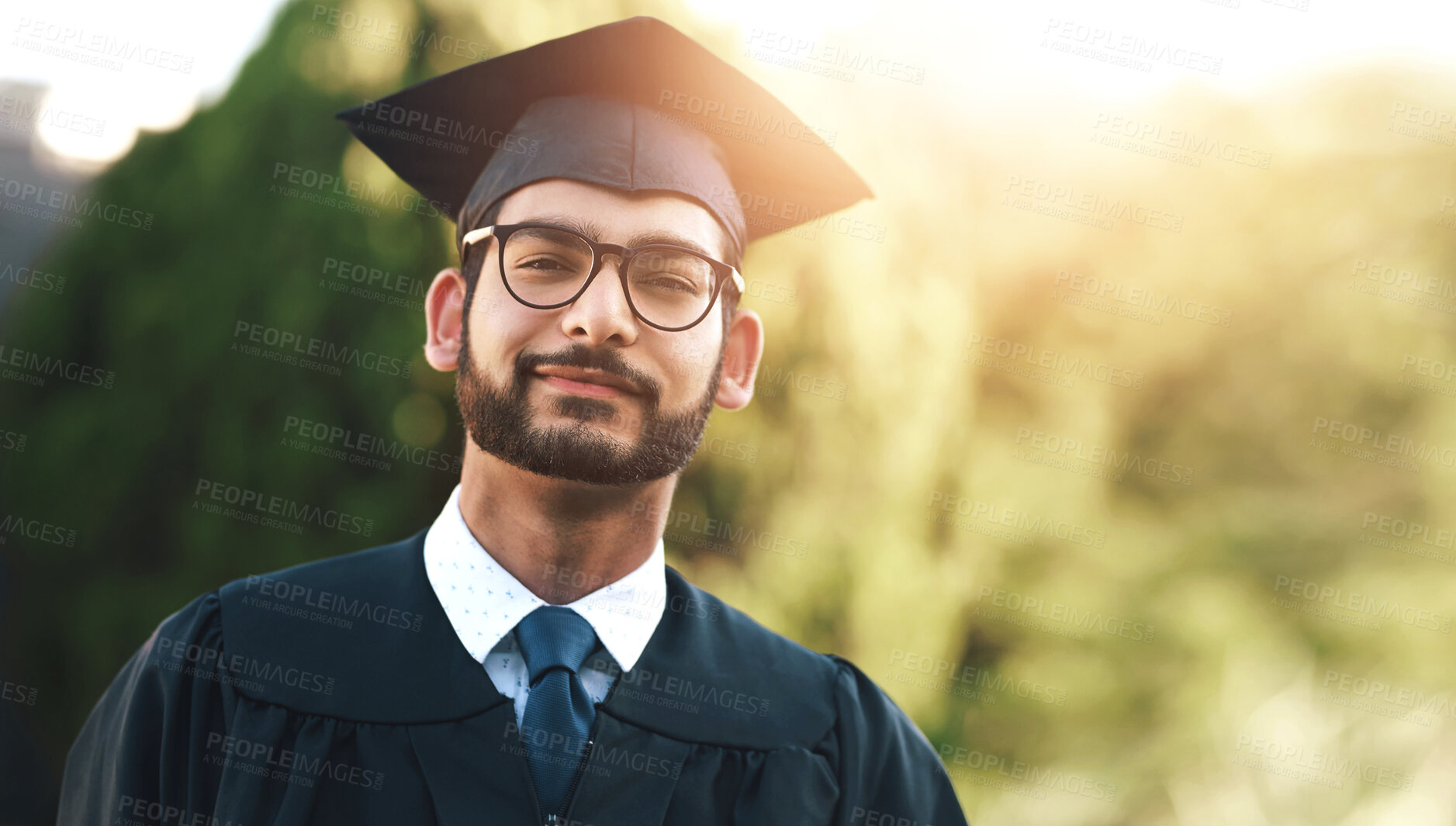 Buy stock photo Smile, graduation and portrait of man on campus for education, college and academic success. Happy, award and study with student for university, degree and scholarship achievement for learning growth