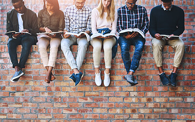 Buy stock photo College student, group and books on wall with legs, learning and progress for development at campus. People, friends and scholarship for education, information and knowledge for future at university