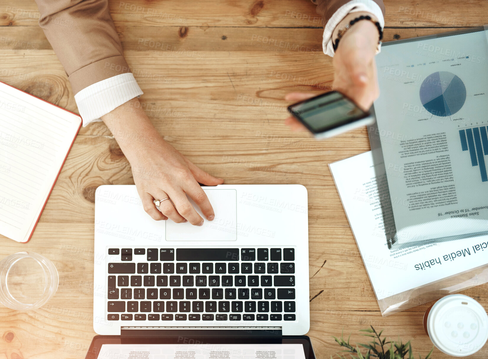 Buy stock photo Hands, laptop and above with charts, report and statistics of company sales for data analysis in office. Business woman, tech and infographic for review, profit and revenue with research or analytics