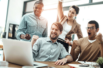 Buy stock photo Creative team, success and celebrate in office for achievement, promotion and winning with laptop. Diversity, people and excited at desk for goals, bonus and collaboration in modern workplace