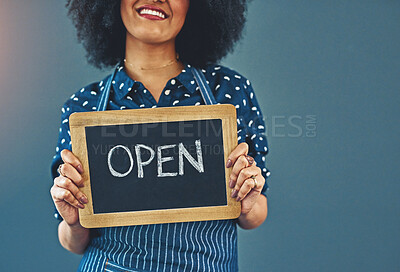 Buy stock photo Happy woman, hands and chalkboard with open sign for welcome or introduction on a studio background. Closeup of female person with smile, billboard or poster ready for service at cafe or restaurant