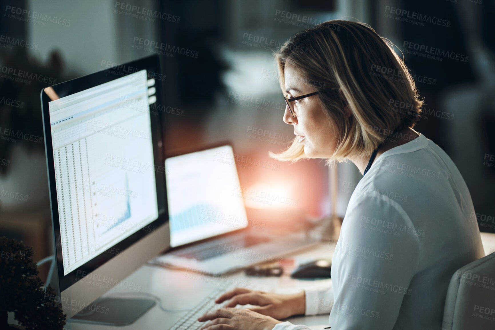 Buy stock photo Screen, graphs and woman with computer in office for investment, analysis and growth of revenue. Business, data analyst and monitor with internet at night for trading portfolio, report and kpi review