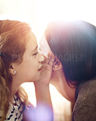 Buy stock photo Gossip, secret or whisper with mother and daughter closeup in home together for security or trust. Children, family or news with girl child talking to single parent woman in apartment for safety