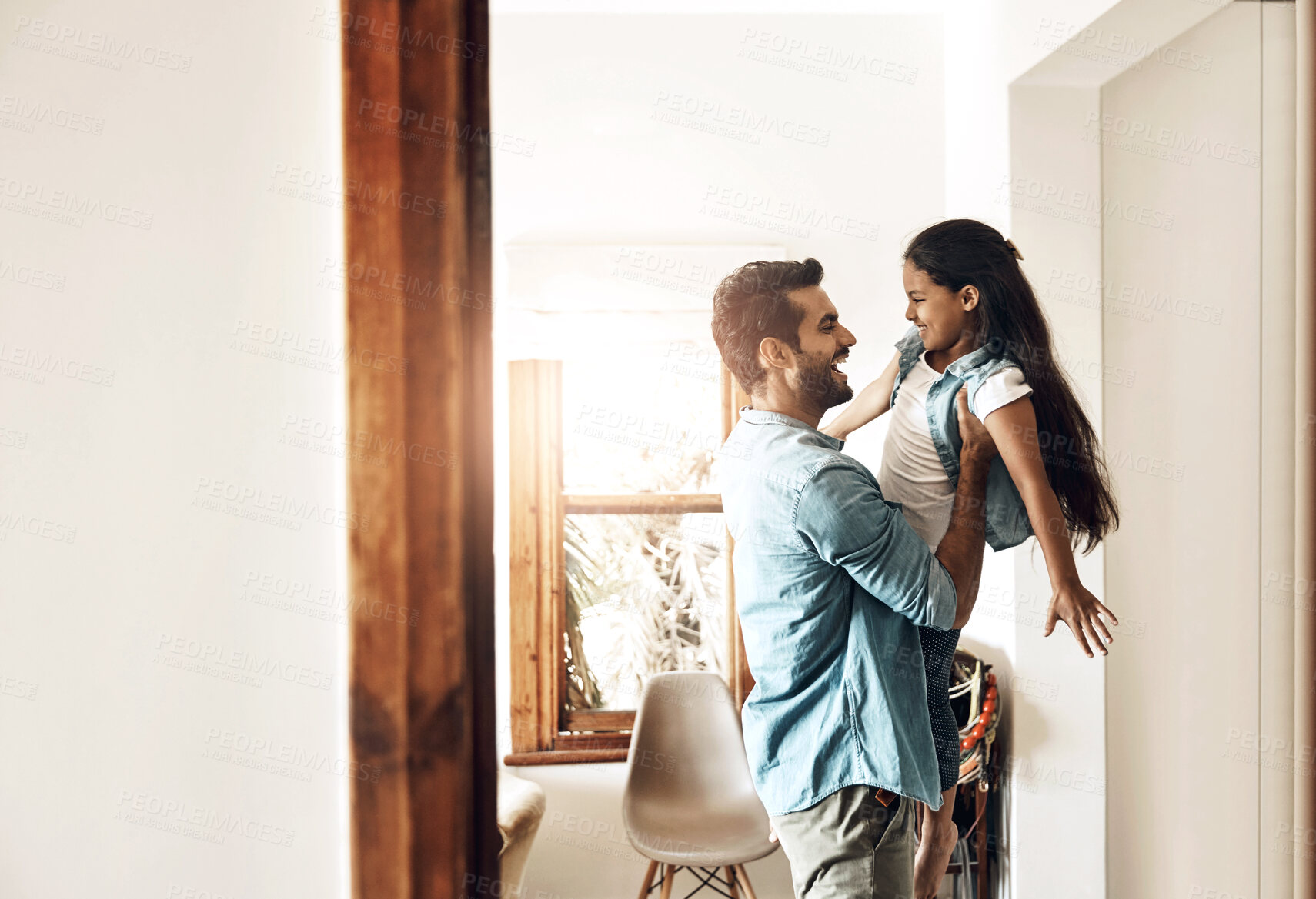 Buy stock photo Father, play and happy child in air with fun, love and bonding together in family home with smile. Morning, man and airplane game with care, funny and young girl with laugh and flying in lounge