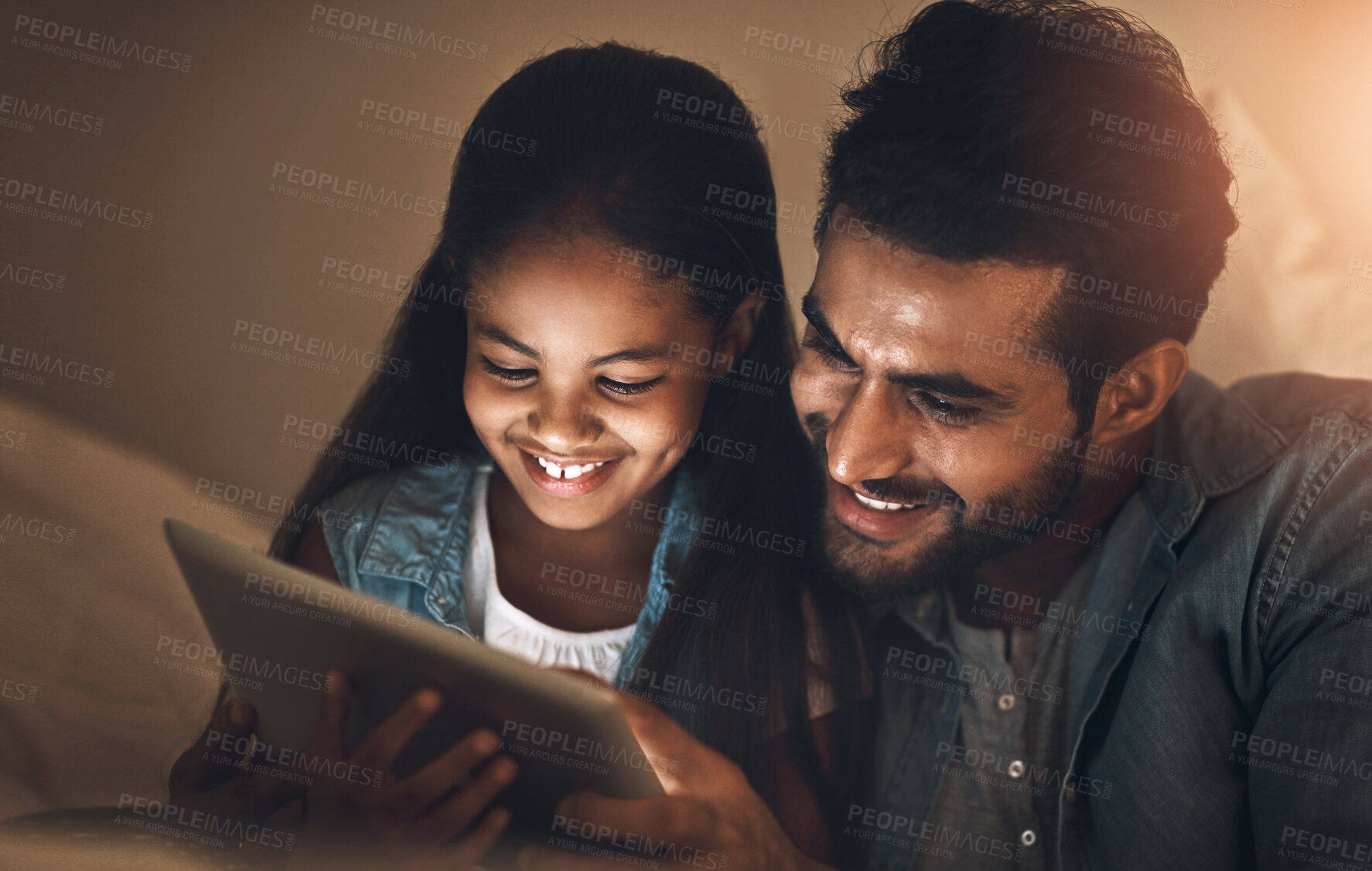 Buy stock photo Bedroom, night and father with girl, tablet and typing with connection, streaming film and smile. Evening, home and family with dad, daughter and kid with tech, digital app for game and cartoon movie