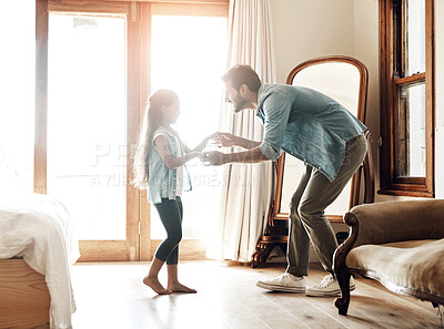 Buy stock photo Dad, daughter and dancing in bedroom for love, fathers day and development at home. Man, young girl and together in family house for energy, entertainment and celebration in apartment for fun