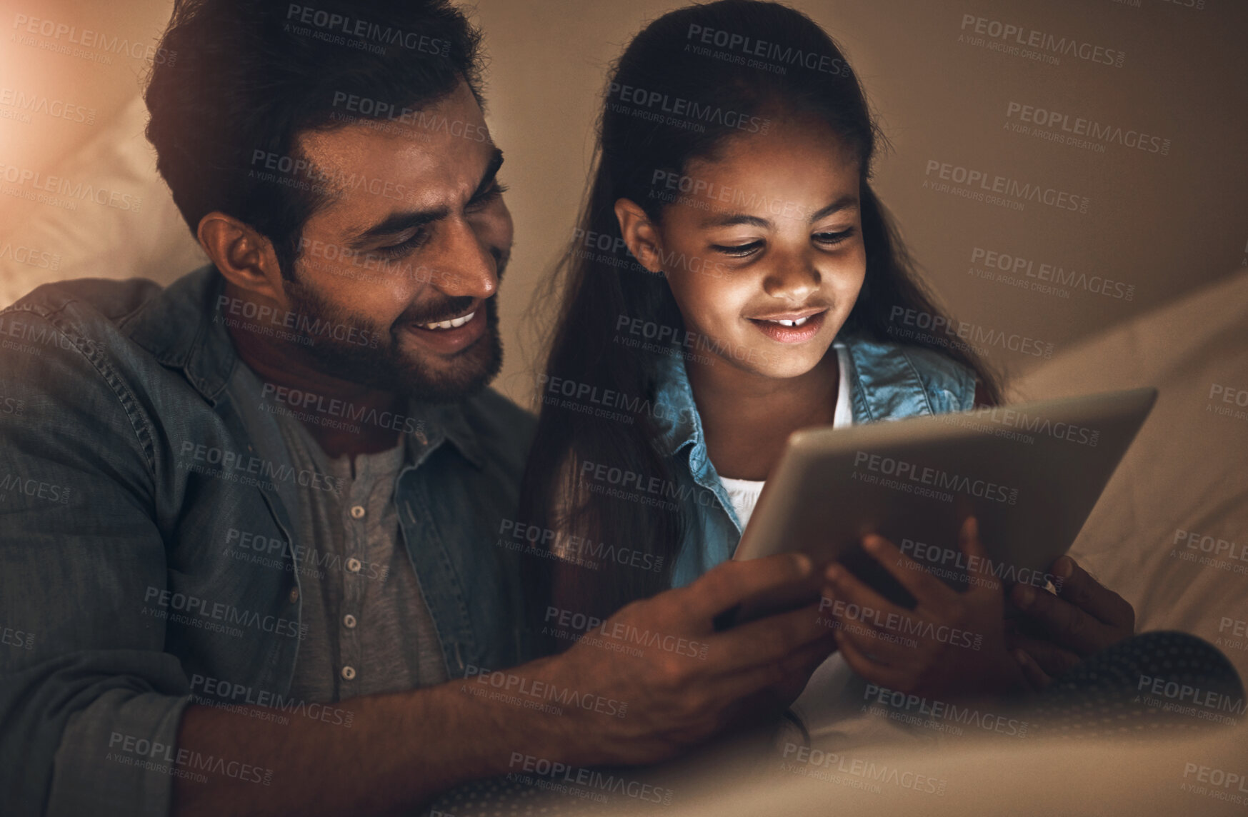 Buy stock photo Home, night and father with girl, tablet and typing with connection, streaming movie and online reading. Evening, house and family with dad, daughter and kid with tech, digital app for game and relax