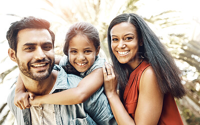 Buy stock photo Family, portrait and child with piggyback, love or support in bonding, together and relationship. Woman, man and kid with smile in outdoor on weekend, break or holiday for development, growth or care