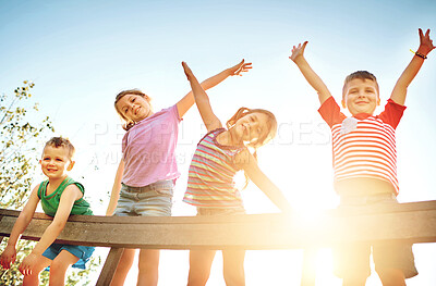 Buy stock photo Friends, children and portrait with fun outdoor, park and garden by wooden fence in nature. Happy kids, boys and girls with airplane hands, playful and bonding together for development by flare