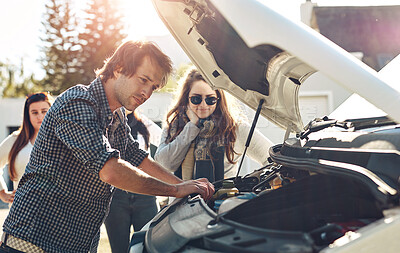 Buy stock photo Breakdown, engine and road trip with friends outdoor together for holiday, travel or vacation. Car trouble, hood and vehicle with man checking motor of transportation for maintenance or repair