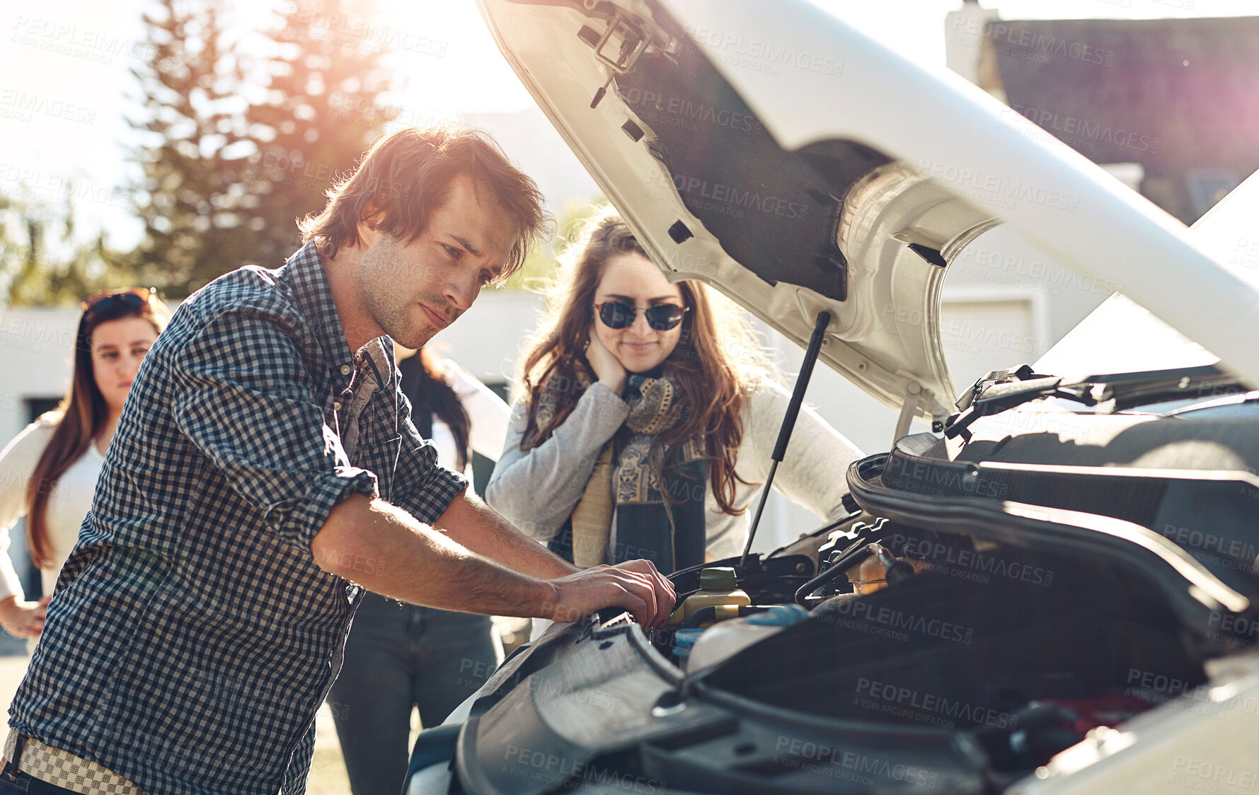 Buy stock photo Breakdown, engine and road trip with friends outdoor together for holiday, travel or vacation. Car trouble, hood and vehicle with man checking motor of transportation for maintenance or repair