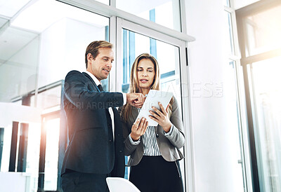 Buy stock photo Business people, partnership and tablet with talking in office for briefing on b2b collaboration or project management. Teamwork, digital tech and meeting on company growth and review on kpi goals