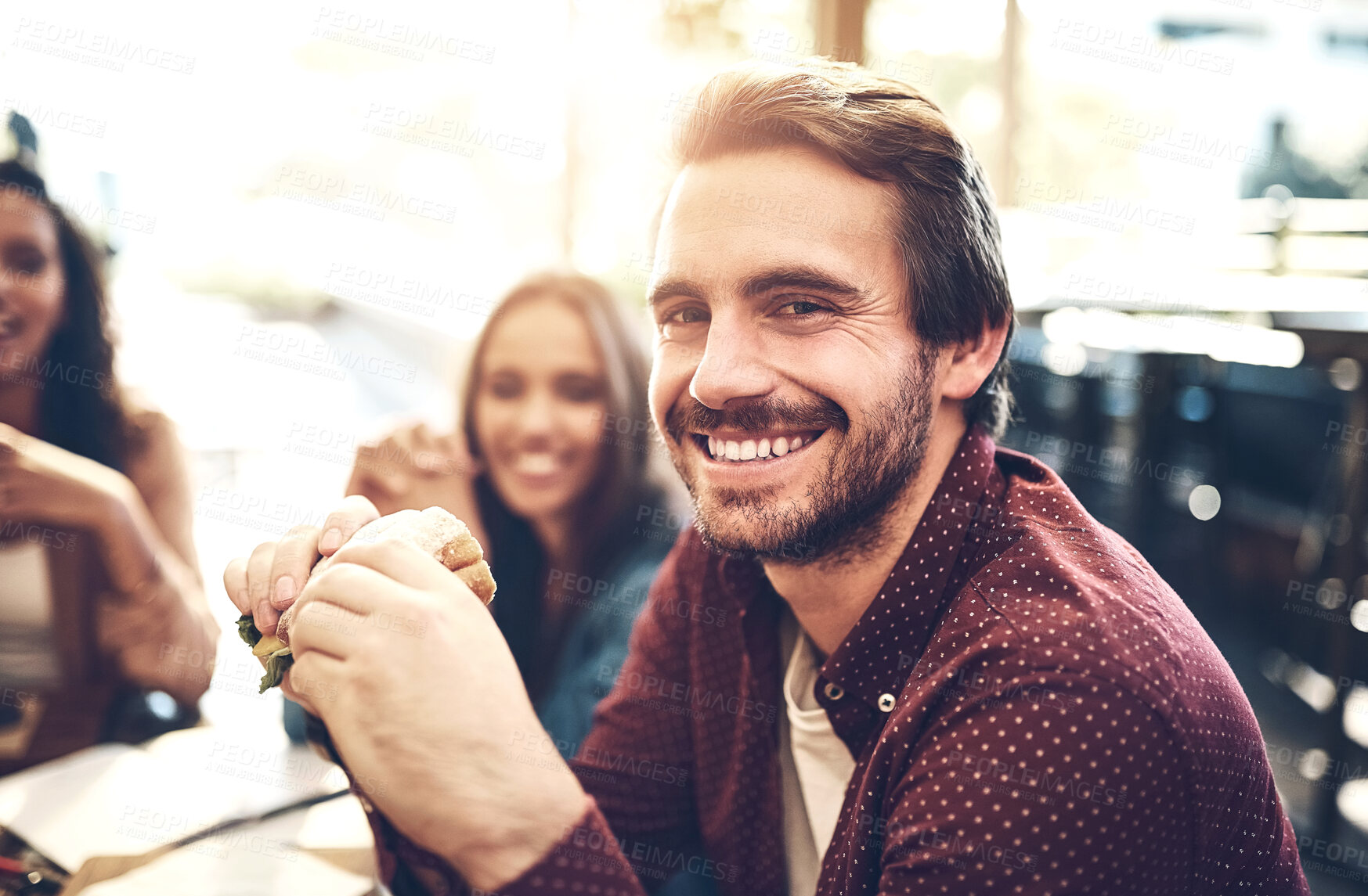 Buy stock photo Business lunch, portrait and sandwich with designer man at restaurant for collaboration or meeting. Face, happy and smile of creative employee in cafe or coffee shop for eating, food and hunger