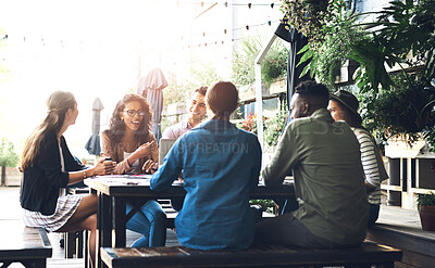 Buy stock photo Business people, discussion and meeting with team at cafe for collaboration, ideas or conversation. Young group of happy or creative employess discussing project for startup at outdoor coffee shop