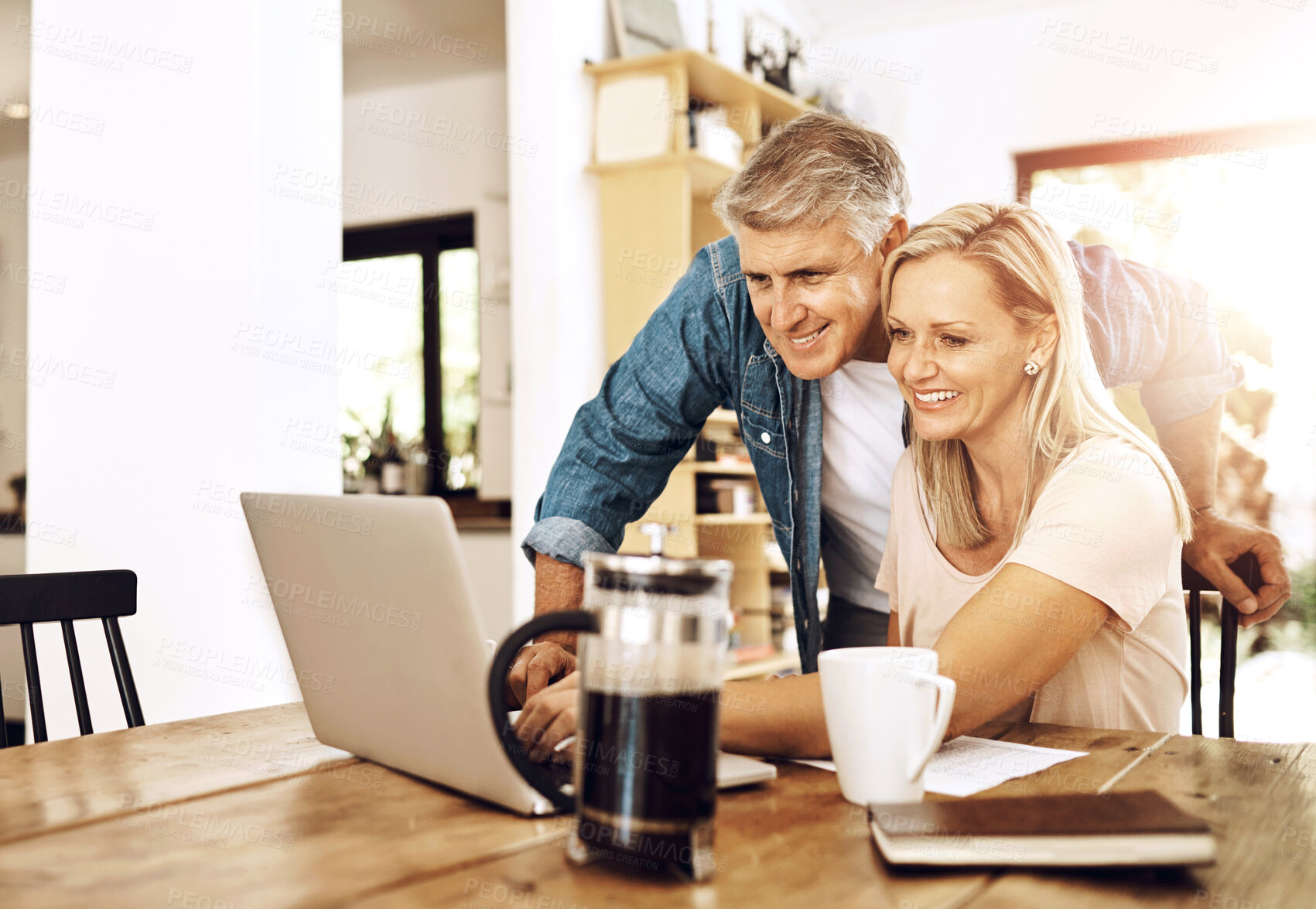 Buy stock photo Happy couple, laptop and budget in living room for vacation, retirement and planning at home. Senior man, woman and together on computer for finance, money and savings account for holiday with joy