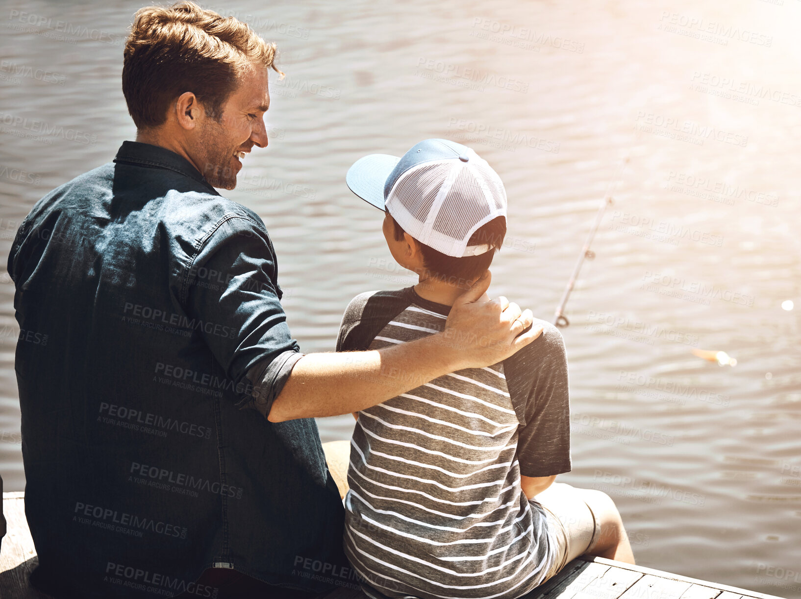 Buy stock photo Fishing, lake and father with child in nature for teaching skill, adventure and vacation together outdoors. Family, happy and dad with young boy by river with rod for sports, hobby and catch fish