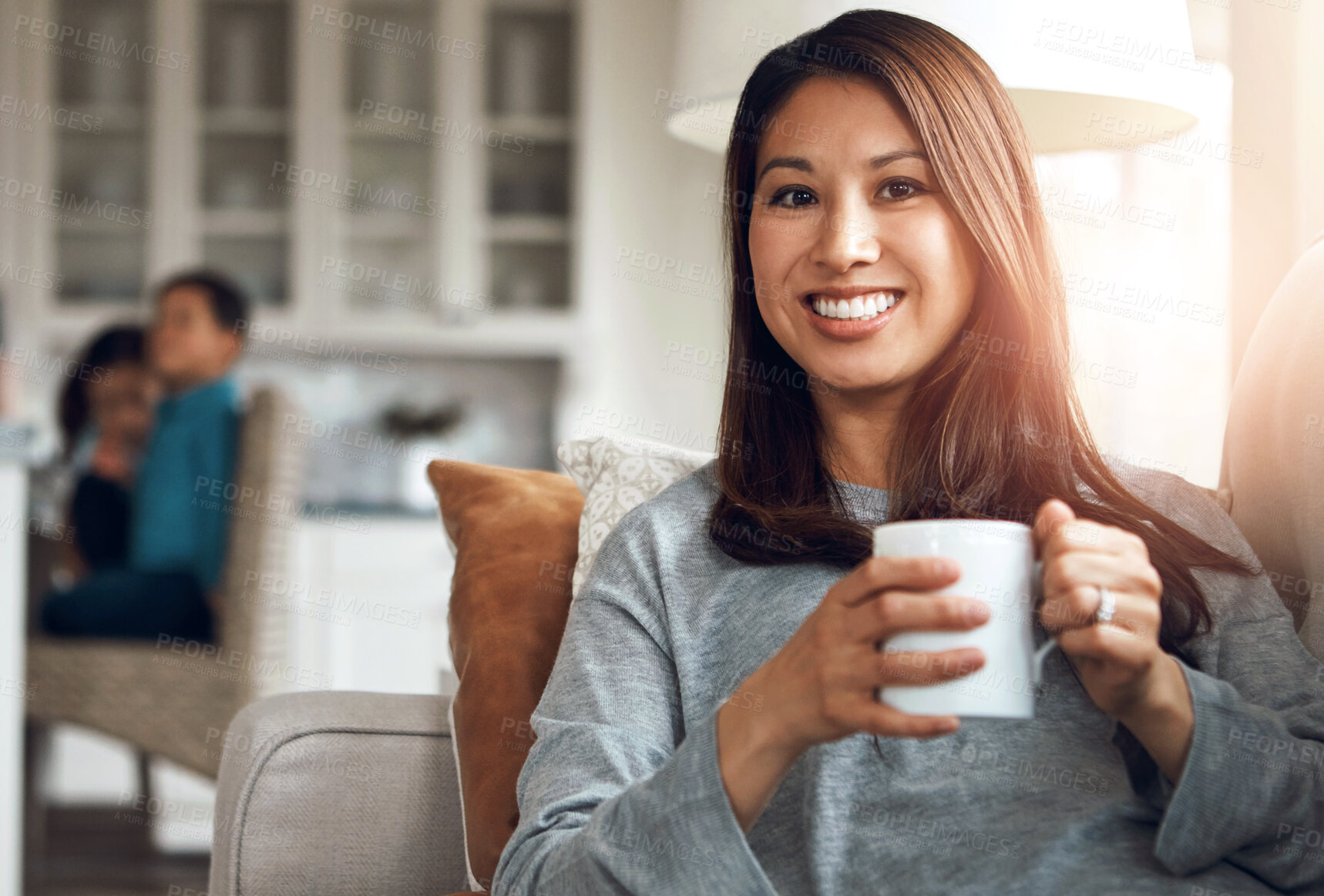 Buy stock photo Relax, portrait and woman with coffee on sofa for happiness, satisfaction or weekend break in living room. Lens flare, smile and female person with mug for peace, calm or drinking morning tea in home