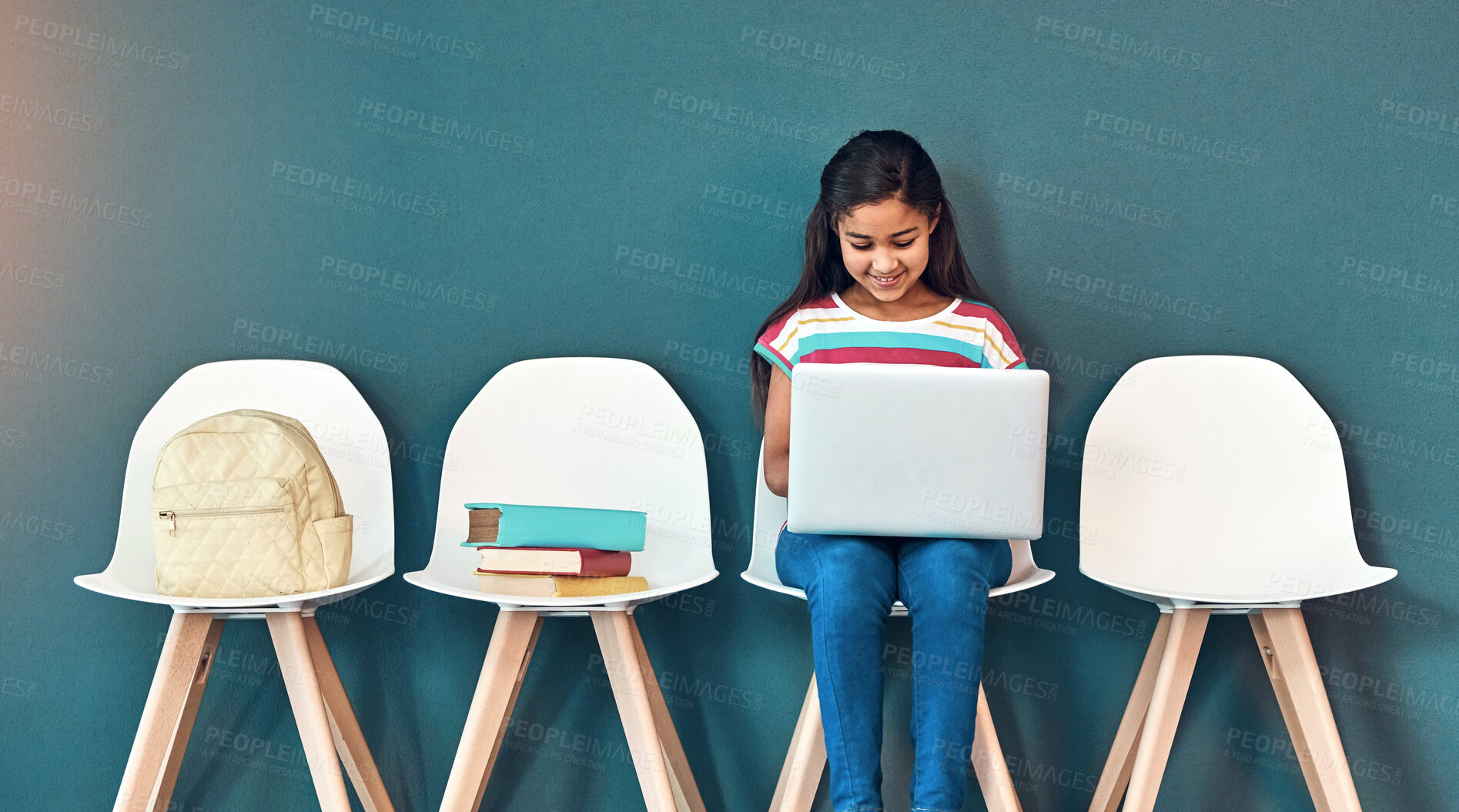 Buy stock photo Admission, education and laptop with girl student in waiting room of school for entrance exam or interview. Chairs, children and computer with academic candidate getting ready for learning assessment