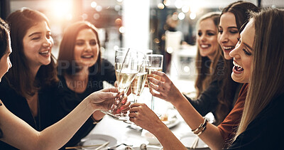 Buy stock photo Drink, smile and toast with friends at dinner party together for celebration, event or social gathering. Alcohol, beverage and cheers with group of happy young people at restaurant venue for bonding