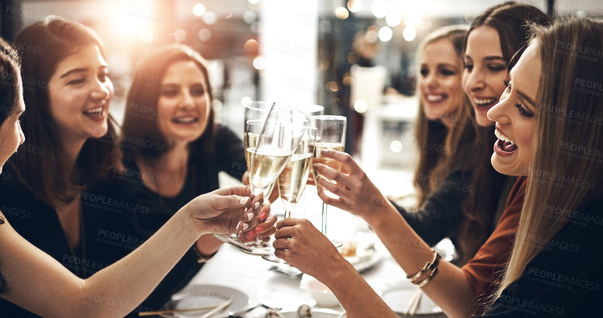 Buy stock photo Drink, smile and toast with friends at dinner party together for celebration, event or social gathering. Alcohol, beverage and cheers with group of happy young people at restaurant venue for bonding