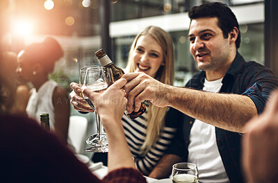 Buy stock photo Alcohol, glass and toast with friends at party together for new year celebration, event or social gathering. Cheers, crowd and smile with group of happy young people at venue for bonding or drinking