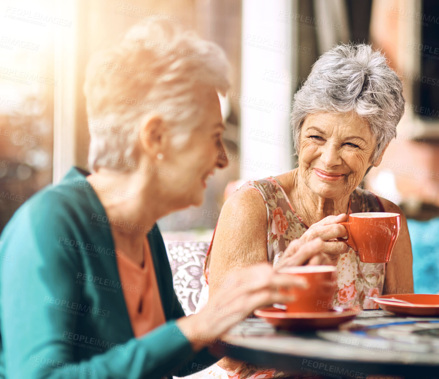 Buy stock photo Senior women, coffee and relax at cafe for retirement, communication and happiness on vacation. Elderly, female friends or tea in restaurant with conversation, smile for travel or holiday in Portugal