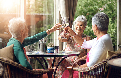 Buy stock photo Senior woman, cheers and friends in restaurant for wine, vacation and retirement together with happy. Elderly people, reunion and relax in diner for drinks, toast and social celebration with memory