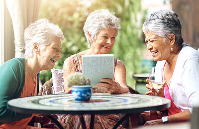 Buy stock photo Senior woman, cafe and friends with tablet for memory, bonding and laughing while drinking wine. Elderly people, restaurant and relax with technology for internet, joke and social media with alcohol