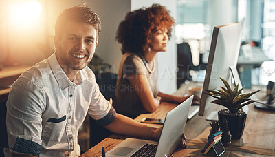 Buy stock photo Portrait, man and team in office at night for social media management, deadline and success. Technology, collaboration and male creator at desk with partner, happiness and positive review on internet