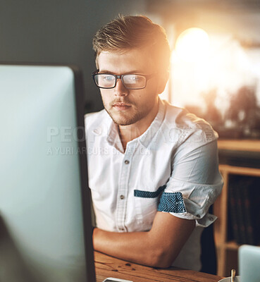 Buy stock photo Man, computer and night in office for planning, research and web designer for proposal. Male person, employee and networking or website for online tasks, project management and pc on late shift