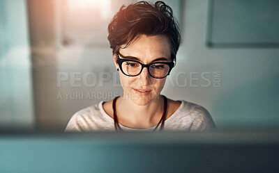 Buy stock photo Creative, woman and reading in office at night for overtime, copywriting and finish story for article at agency or startup. Employee, journalist and online with glasses for working late for deadline.