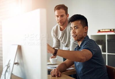 Buy stock photo Designer, men and computer at table for feedback, development and collaboration in office. Partners, web design and communication in workplace with technology, creativity and talking at desk