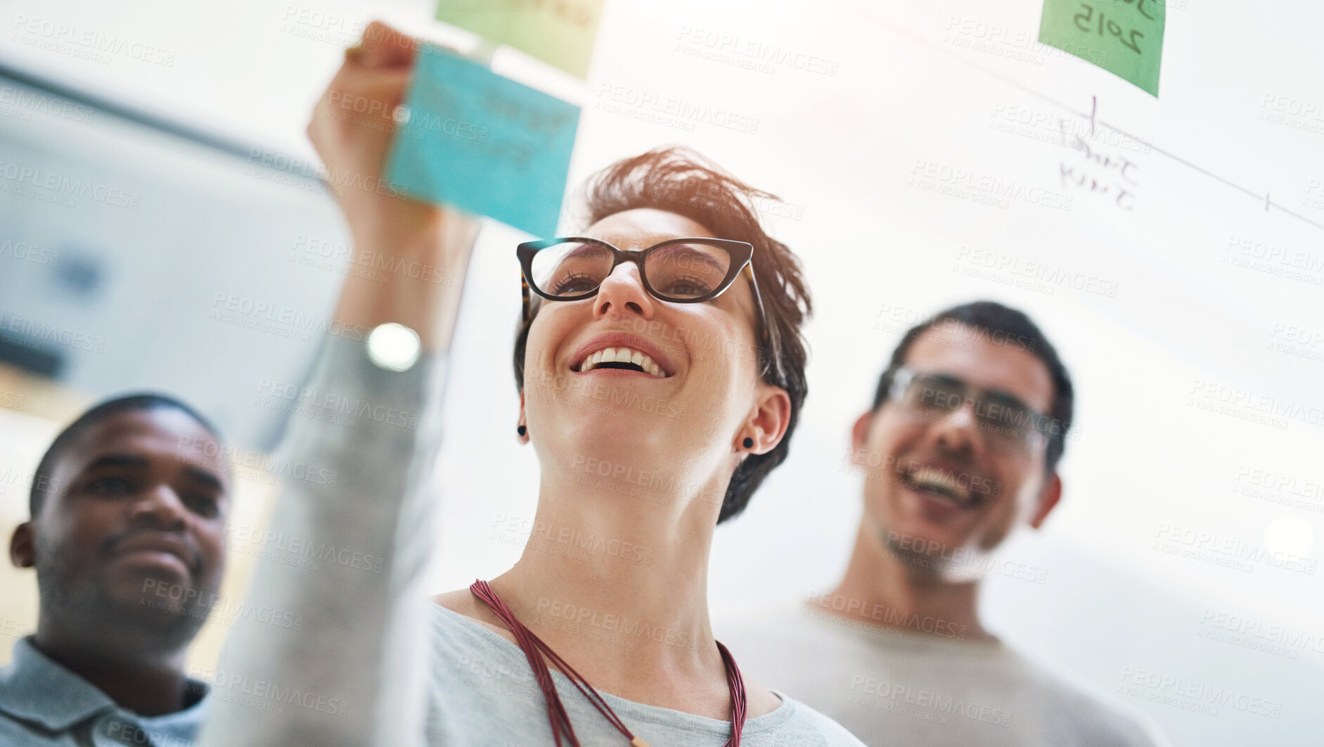 Buy stock photo Woman, smile and sticky notes on glass for writing, timeline and and brainstorming in workshop. Female person, presentation and group training in boardroom for teaching, collaboration and instruction