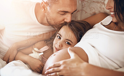 Buy stock photo Happy family, child and pregnancy on bed with love, support and daughter in portrait. Parents, girl and kiss in bedroom for growth, safety and security at home with happiness, smile and care