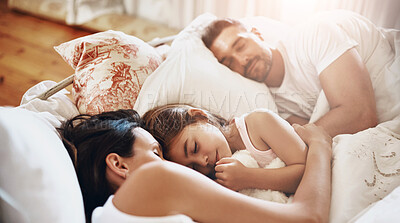 Buy stock photo Family, parents and child sleeping in bed for peace, calm and relax together for love in home. Mother, father and girl kid in bedroom to rest for health, dream and cuddle for comfort or tired