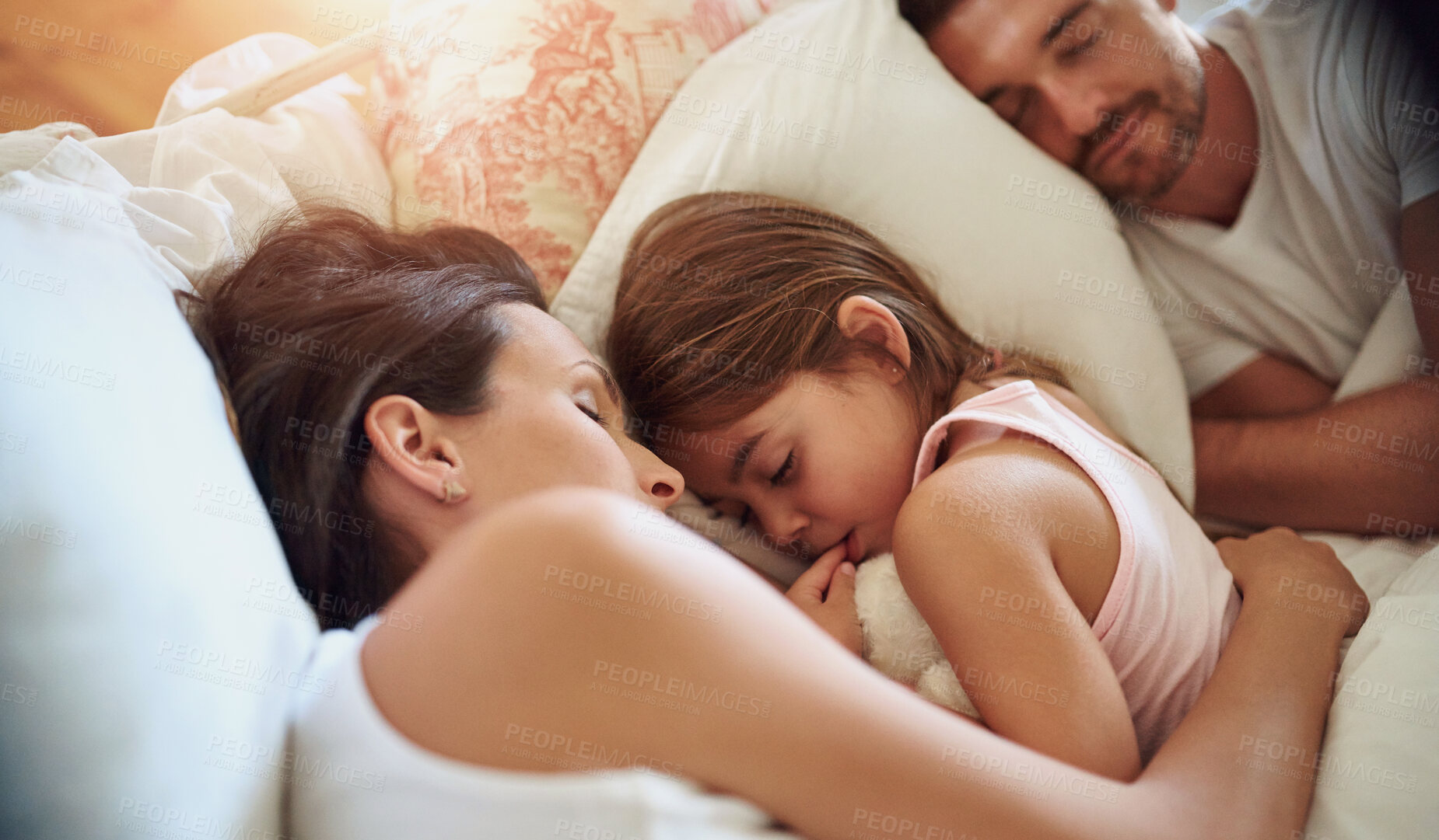 Buy stock photo Family, parents and kid sleeping in bedroom for peace, calm and relax together for love in home. Mother, father and girl child in bed to rest for health, dream and cuddle for comfort or tired