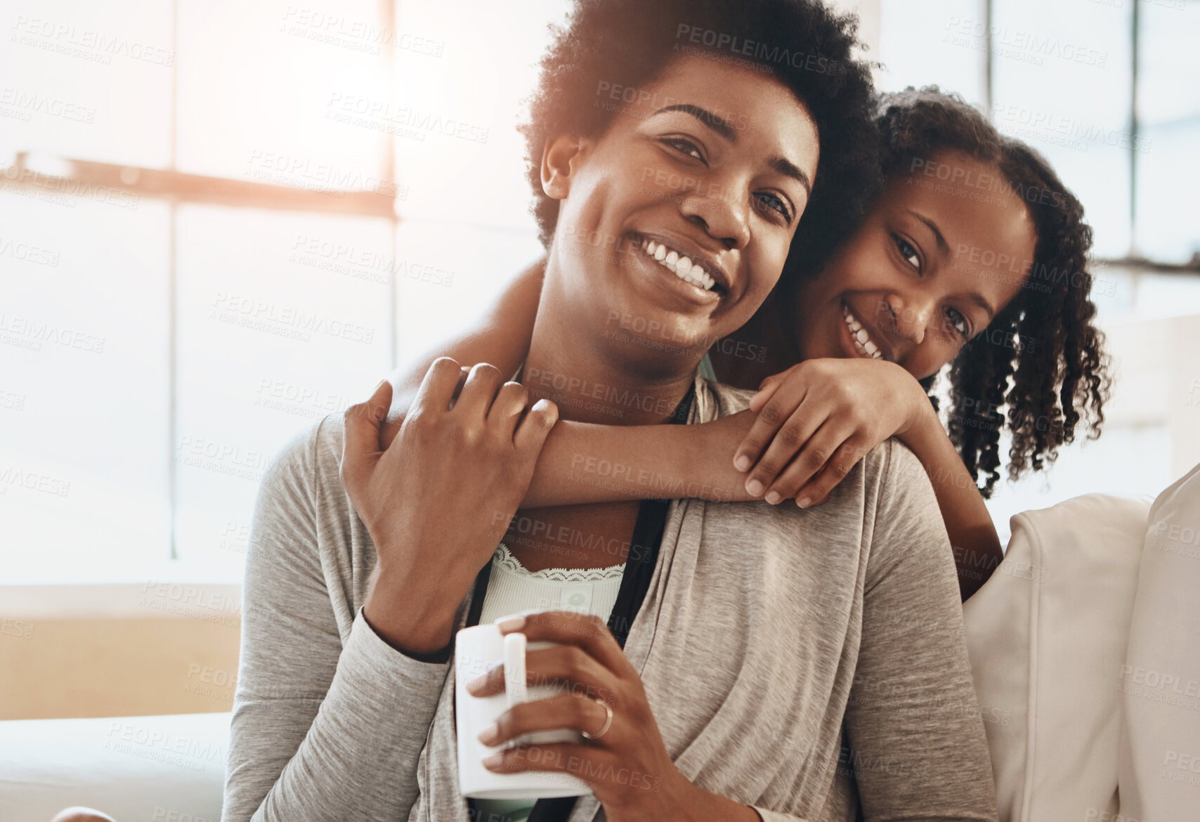 Buy stock photo Hug, sofa and portrait of mother with child in home for bonding, relationship and relax on weekend. Black family, happy and mom with girl embrace for affection, love and support in living room