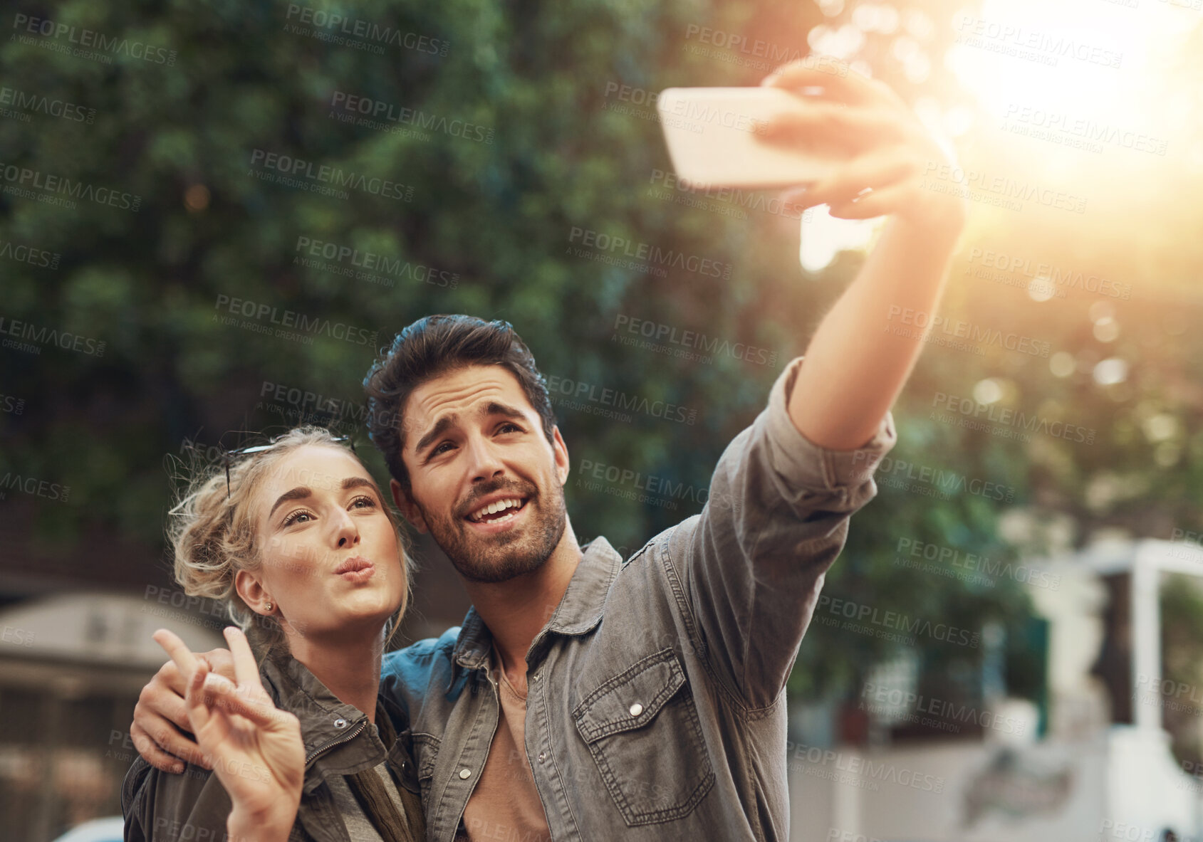 Buy stock photo Couple, happy and selfie outdoor with travel for profile picture update, memory and social media post. People, photography and peace sign on holiday, summer vacation or adventure in nature with love