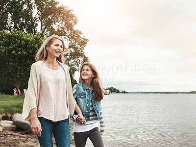 Buy stock photo Holding hands, lake or walking with mother and daughter outdoor in nature together for bonding. Family, love or summer with woman and girl child by water in park for security, support or trust