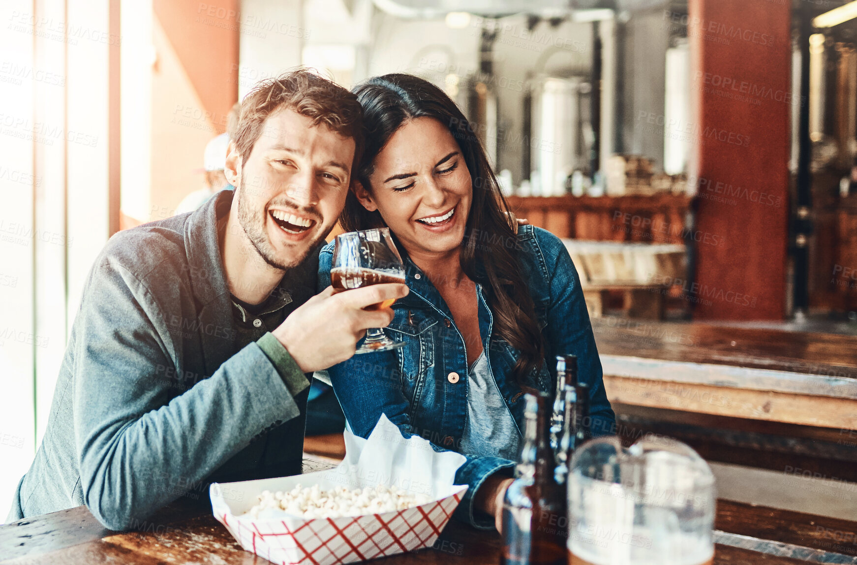 Buy stock photo Friends, beer and celebration in restaurant, smile and students with happiness, bonding together and relax. Portrait, people and man with woman, alcohol and social gathering with  drinks and laughing