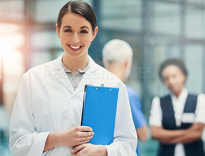 Buy stock photo Woman, doctor and clipboard in portrait at hospital with smile, working in healthcare and medicine. Female person, health insurance paperwork and happiness at clinic for consulting, advice and pride