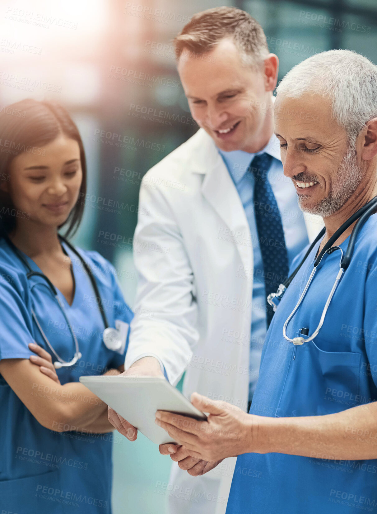 Buy stock photo Healthcare, team and discussion with tablet in hospital for medical results, information and planning. Doctor, nurse and employees with technology in conversation for cardiology, report and feedback