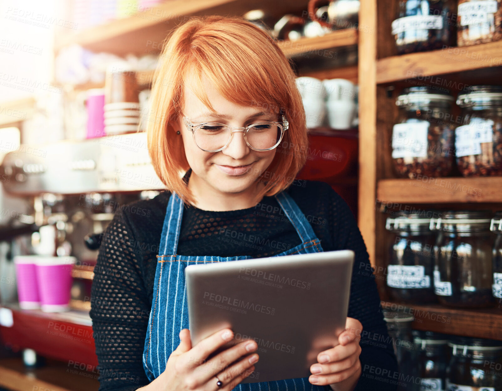 Buy stock photo Woman, tablet and cafe as waitress in small business with happiness in restaurant or coffee shop. Female person, cafeteria and bistro for food service as entrepreneur in startup in New York City