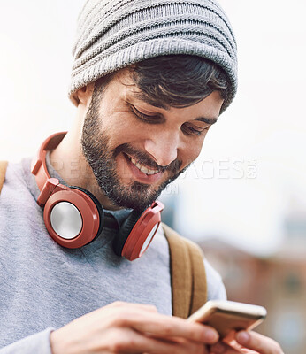 Buy stock photo Smile, backpack and man with smartphone in city for travel, communication and search of location. Happy, male person and headphones with tech for outdoor journey, information and tourism in London