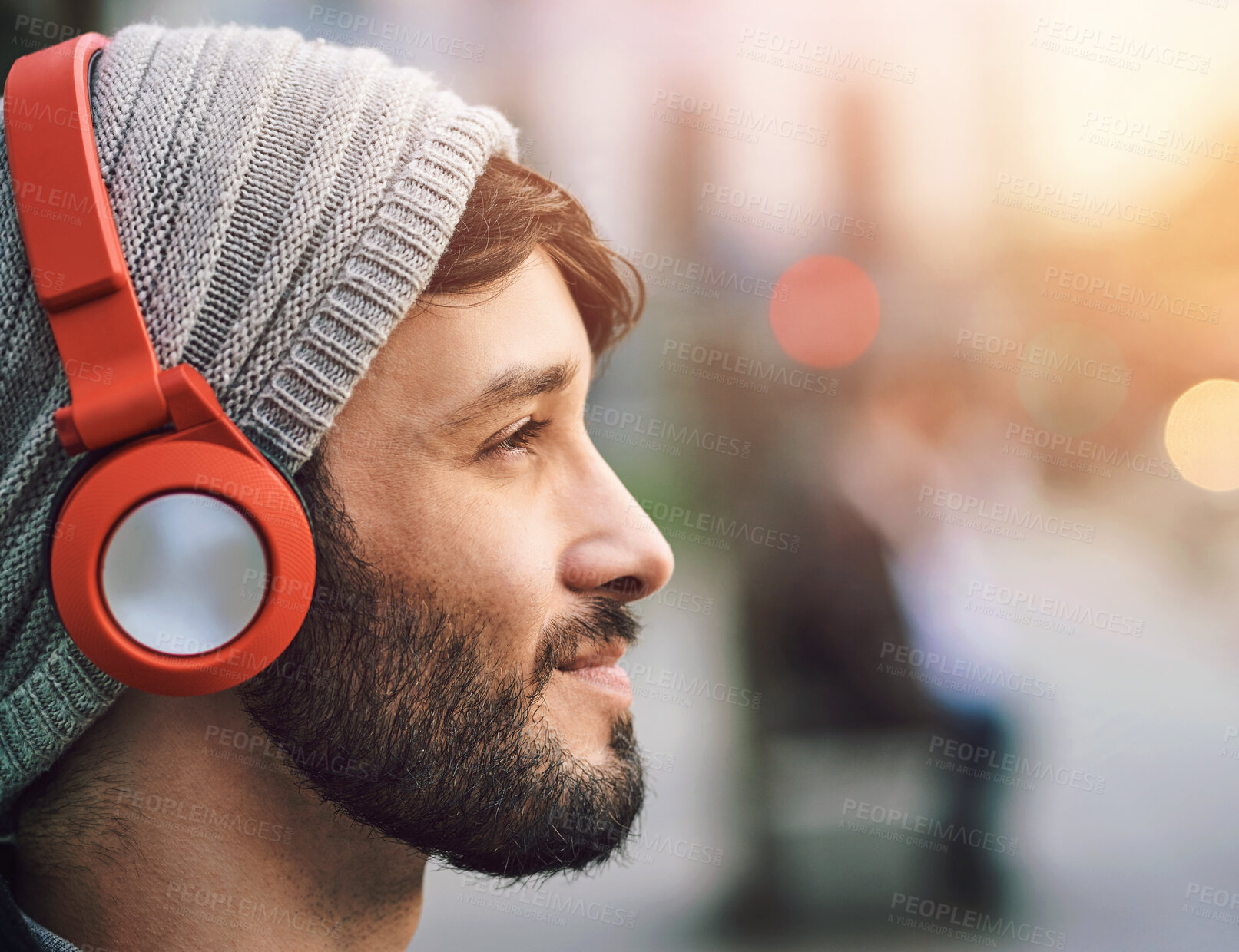 Buy stock photo Music, travel and profile of man with headphone in city for commute, streaming podcast or radio. Bokeh, sound and person for morning journey, listening to playlist or song on internet in urban town