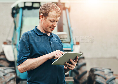 Buy stock photo Farmer, internet and man with tablet by tractor for production, schedule and research on industry. Farming, website and male person with tech for agriculture, information and reading weather update