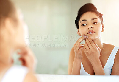 Buy stock photo Acne, squeeze and face of woman in bathroom for skincare, facial and self care with morning routine. Hygiene, inspection and cleaning with girl and popping pimple on cheek for blemish, flaws and scar