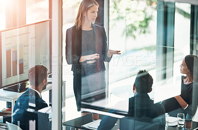 Buy stock photo Business woman, graph and presentation in office for planning, strategy and review with feedback. Team, meeting and employee development for project update, workshop and financial report with screen